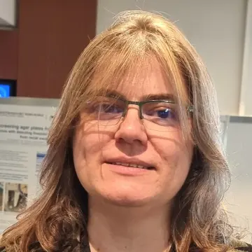 Irina Manolescu<sup>2</sup>